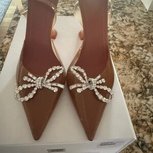 Amina Muaddi Brown Heels with Rhinestone Bow